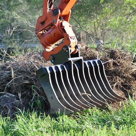 root rake mini excavator|mini excavator rock rake attachments.